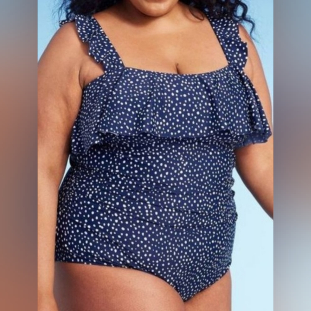 Navy blue polka-dot one piece swimsuit